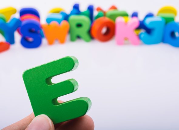 Letter cubes of e made of wood